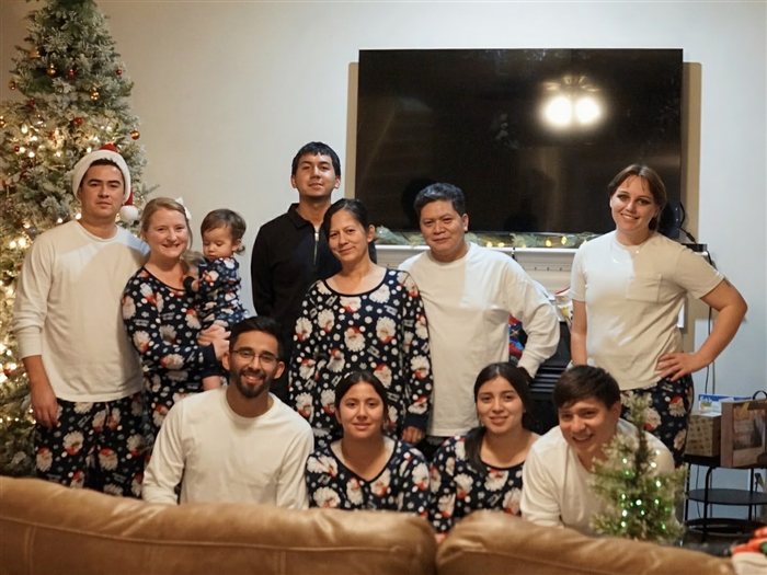 Maritza with her husband, children, and granddaughters